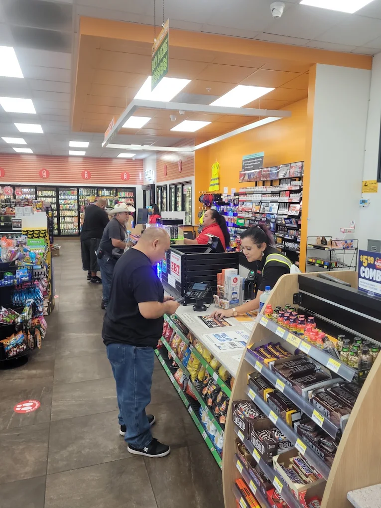 Drivers checking out inside the Roadside Oasis convenience store